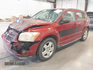 2009 Dodge Caliber SXT with VIN 1B3HB48A79D108706, listed as a IAAI auction lot 41555213 with 159,577 mi miles and . Bid and sale history available at DreamBid. Image 2.