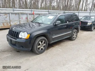 2009 Jeep Grand Cherokee Laredo with VIN 1J8GR48K19C546439, listed as a IAAI auction lot 42097256 with 146,930 mi miles. Bid and sale history available at carsss.com. Image 2.