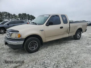 1999 Ford F-150 with VIN 1FTZX1721XNA37541, listed as a Copart auction lot 51588415 with 267,071 mi miles and Salvage title. Bid and sale history available at DreamBid. Image 1.