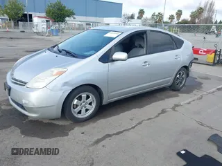 2005 Toyota Prius with VIN JTDKB20U257017611, listed as a IAAI auction lot 42087781 with 263,985 mi miles. Bid and sale history available at carsss.com. Image 2.