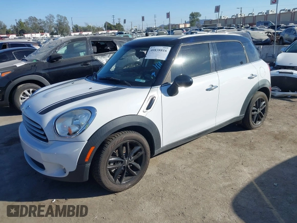 2014 MINI Countryman with VIN WMWZB3C59EWR40065, listed as a IAAI auction lot 40838816 with 80,000 mi miles and . Bid and sale history available at DreamBid. Image 2.