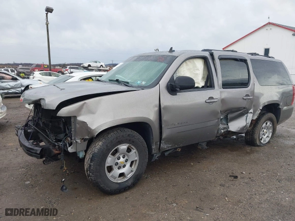2009 Chevrolet Suburban LT w/2LT with VIN 1GNFC26J39R236980, listed as a IAAI auction lot 41721772 with 215,684 mi miles. Bid and sale history available at carsss.com. Image 2.