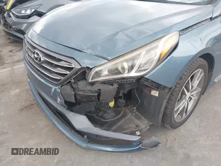 2015 Hyundai Sonata Sport z VIN 5NPE34AB8FH232023, wystawiony jako IAAI lot #42093888 z przebiegiem 212 144 mil mil oraz . Historia ofert i sprzedaży dostępna na DreamBid. Obrazek 6.