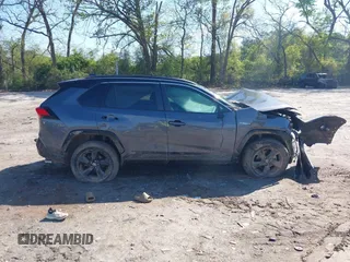 2021 Toyota RAV4 Hybrid XSE with VIN 2T3E6RFV2MW017668, listed as a IAAI auction lot 42008581 with Not provided miles and . Bid and sale history available at DreamBid. Image 14.