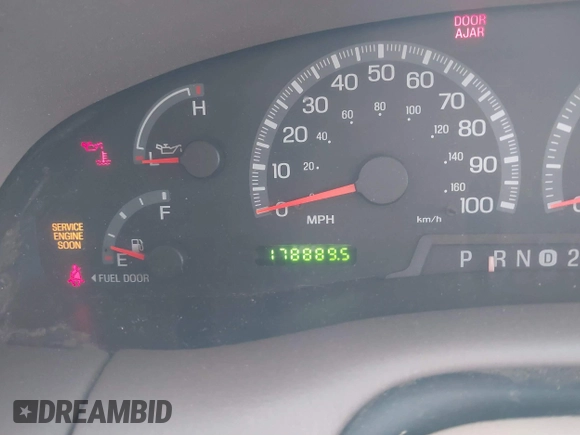 1999 Ford F-150 XL with VIN 1FTRX18L1XKB61205, listed as a IAAI auction lot 40991236 with 178,889 mi miles. Bid and sale history available at carsss.com. Image 15.