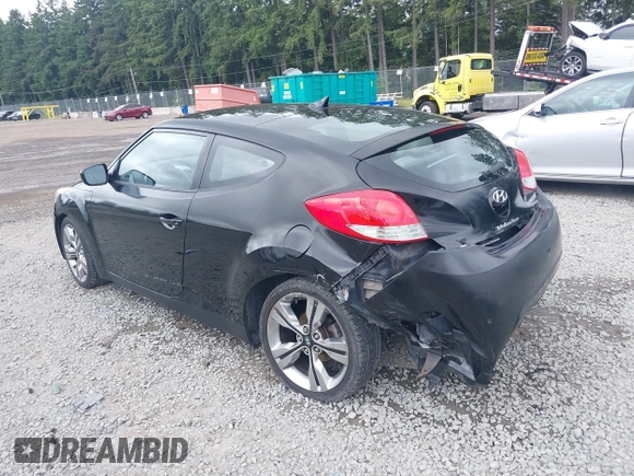 2012 Hyundai Veloster w/Gray Int with VIN KMHTC6AD4CU062034, listed as a IAAI auction lot 42371790 with 116,861 mi miles and . Bid and sale history available at DreamBid. Image 3.
