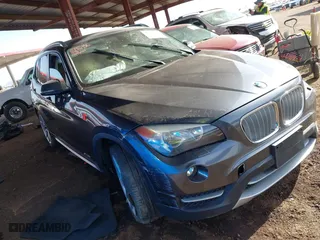 2013 BMW X1 28i with VIN WBAVM1C57DVW42096, listed as a IAAI auction lot 41572971 with 156,999 mi miles. Bid and sale history available at carsss.com. Image 6.