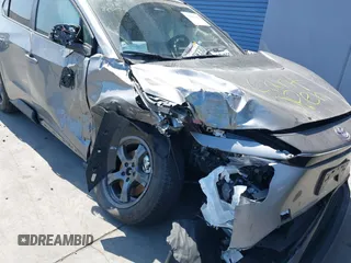 2024 Toyota bZ4X XLE z VIN JTMAAAAA4RA042628, wystawiony jako IAAI lot #41801949 z przebiegiem 10 279 mil mil oraz . Historia ofert i sprzedaży dostępna na DreamBid. Obrazek 6.