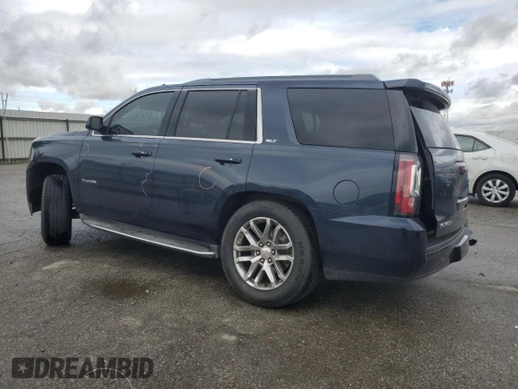 2017 GMC Yukon SLT with VIN 1GKS1BKC5HR295827, listed as a Copart auction lot 48189565 with 106,867 mi miles and Salvage Title. Bid and sale history available at carsss.com. Image 2.