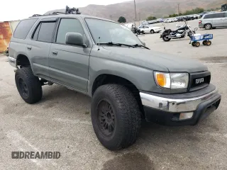 1999 Toyota 4Runner SR5 with VIN JT3GN86R4X0095939, listed as a Copart auction lot 60755965 with 276,622 mi miles and Salvage title. Bid and sale history available at DreamBid. Image 4.