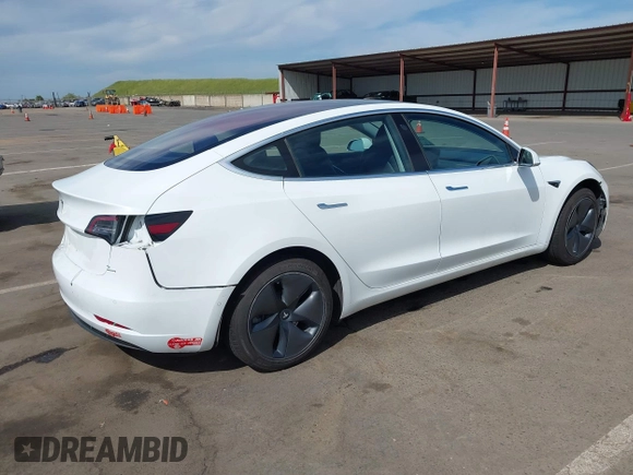 2018 Tesla Model 3 Long Range Battery with VIN 5YJ3E1EA2JF023370, listed as a IAAI auction lot 42008406 with 163,474 mi miles and . Bid and sale history available at DreamBid. Image 4.