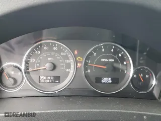 2009 Jeep Grand Cherokee Laredo with VIN 1J8GR48K69C553631, listed as a Copart auction lot 51572875 with 189,837 mi miles and Salvage Title. Bid and sale history available at carsss.com. Image 9.