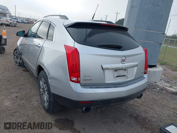 2013 Cadillac SRX z VIN 3GYFNAE38DS568509, wystawiony jako IAAI lot #41199017 z przebiegiem 137 267 mil mil oraz . Historia ofert i sprzedaży dostępna na DreamBid. Obrazek 3.