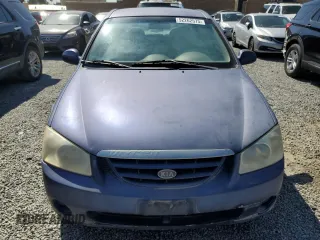 2004 Kia Spectra LX with VIN KNAFE122845046827, listed as a Copart auction lot 52262575 with 91,786 mi miles and Clean Title. Bid and sale history available at carsss.com. Image 5.