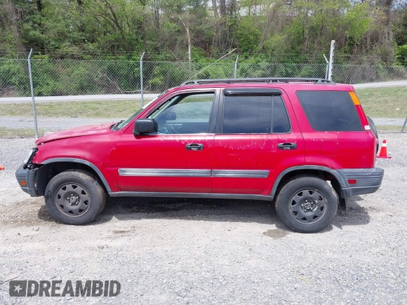 2000 Honda CR-V LX with VIN JHLRD184XYC010847, listed as a IAAI auction lot 42080100 with 256,678 mi miles and . Bid and sale history available at DreamBid. Image 14.