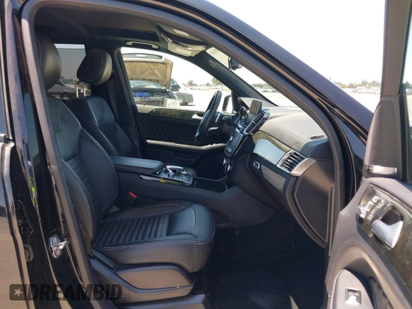 2018 Mercedes-Benz GLE 550e with VIN 4JGDA6DB8JB166698, listed as a IAAI auction lot 42483143 with 77,601 mi miles and . Bid and sale history available at DreamBid. Image 5.