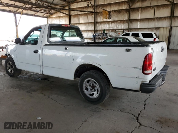 2003 Ford F-150 XL with VIN 1FTRF17243NB73840, listed as a Copart auction lot 58356935 with 332,670 mi miles and Salvage title. Bid and sale history available at DreamBid. Image 2.