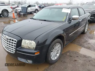 2010 Chrysler 300 Touring with VIN 2C3CA5CV5AH144949, listed as a IAAI auction lot 41955931 with 236,658 mi miles. Bid and sale history available at carsss.com. Image 2.