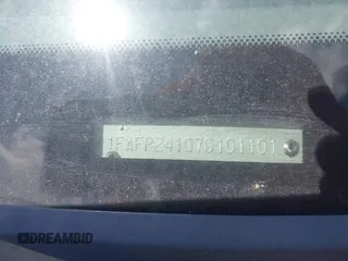 2007 Ford Five Hundred SEL z VIN 1FAFP24107G101101, wystawiony jako IAAI lot #42245174 z przebiegiem Nie podano mil oraz . Historia ofert i sprzedaży dostępna na DreamBid. Obrazek 9.