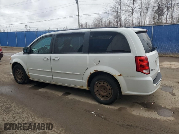 2014 Dodge Grand Caravan American Value with VIN 2C4RDGBG3ER280895, listed as a Copart auction lot 54351905 with 266,418 mi miles and Clean Title. Bid and sale history available at DreamBid. Image 2.