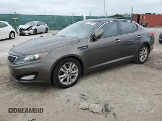 2011 Kia Optima EX with VIN KNAGN4A65B5139487, listed as a Copart auction lot 76731764 with Not Provided miles and Salvage Title. Bid and sale history available at carsss.com. Image 1.