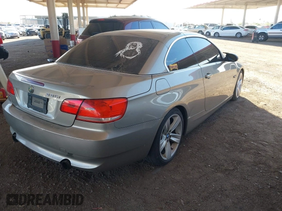2007 BMW 3 Series 335i with VIN WBAWL73517PX46117, listed as a IAAI auction lot 40208424 with 117,045 mi miles. Bid and sale history available at carsss.com. Image 4.