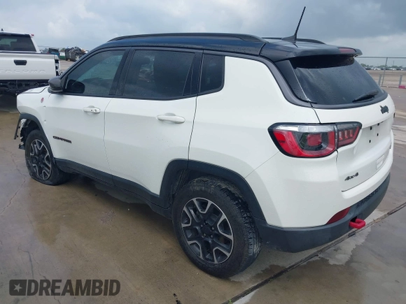 2020 Jeep Compass Trailhawk with VIN 3C4NJDDB3LT118928, listed as a IAAI auction lot 42128120 with 95,477 mi miles and . Bid and sale history available at DreamBid. Image 3.