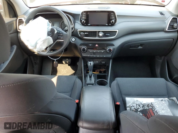 2019 Hyundai Tucson Value z VIN KM8J33A40KU002904, wystawiony jako Copart lot #51064805 z przebiegiem 71 435 mil mil oraz Szkoda całkowita • Salvage title. Historia ofert i sprzedaży dostępna na DreamBid. Obrazek 8.