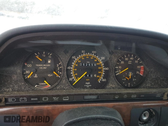 1989 Mercedes-Benz 560 with VIN WDBCA39E0KA469417, listed as a Copart auction lot 43929215 with 52,559 mi miles and Salvage Title. Bid and sale history available at DreamBid. Image 9.