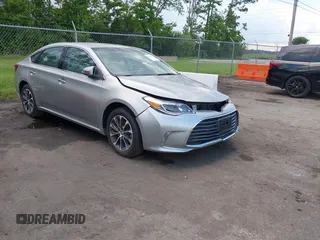 2016 Toyota Avalon Limited z VIN 4T1BK1EB7GU242074, wystawiony jako IAAI lot #42539359 z przebiegiem 37 736 mil mil oraz . Historia ofert i sprzedaży dostępna na DreamBid. Obrazek 1.