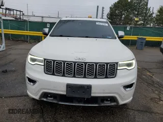 2019 Jeep Grand Cherokee Overland with VIN 1C4RJFCT7KC640527, listed as a Copart auction lot 54276725 with 282,202 mi miles and Salvage title. Bid and sale history available at DreamBid. Image 5.