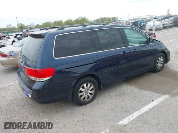 2009 Honda Odyssey EX-L with VIN 5FNRL38769B409281, listed as a IAAI auction lot 42013137 with 213,934 mi miles and . Bid and sale history available at DreamBid. Image 4.