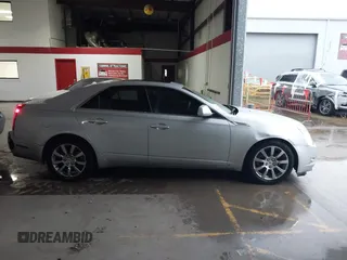 2009 Cadillac CTS RWD w/1SB with VIN 1G6DV57V090157738, listed as a IAAI auction lot 41180254 with 129,361 mi miles. Bid and sale history available at carsss.com. Image 13.