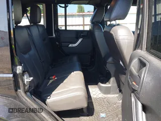 2016 Jeep Wrangler Unlimited Sahara with VIN 1C4BJWEG7GL250357, listed as a IAAI auction lot 42665881 with 102,168 mi miles and . Bid and sale history available at DreamBid. Image 8.