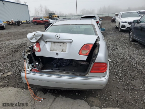 1999 Mercedes-Benz E-Class with VIN WDBJF65H0XA773509, listed as a Copart auction lot 88336875 with 416,203 mi miles and Salvage Title. Bid and sale history available at carsss.com. Image 6.