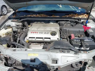 2004 Toyota Solara SE with VIN 4T1FA38P34U031182, listed as a IAAI auction lot 41933785 with 158,624 mi miles. Bid and sale history available at carsss.com. Image 10.