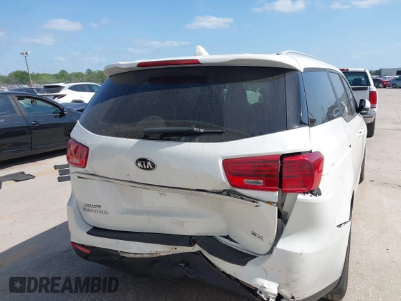 2021 Kia Sedona LX with VIN KNDMB5C12M6661917, listed as a IAAI auction lot 42129682 with 80,321 mi miles and . Bid and sale history available at carsss.com. Image 16.