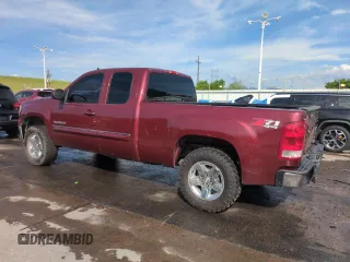 2013 GMC Sierra 1500 SLT z VIN 1GTR2WE70DZ280479, wystawiony jako Copart lot #58602555 z przebiegiem 140 849 mil mil oraz Szkoda całkowita • Salvage title. Historia ofert i sprzedaży dostępna na DreamBid. Obrazek 2.