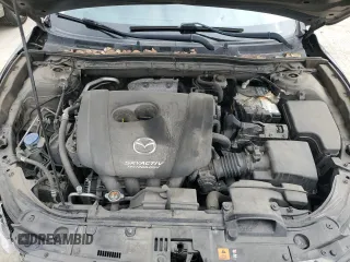 2014 Mazda 3 S Touring with VIN JM1BM1V31E1105847, listed as a Copart auction lot 50045925 with 121,538 mi miles and Salvage Title. Bid and sale history available at DreamBid. Image 12.