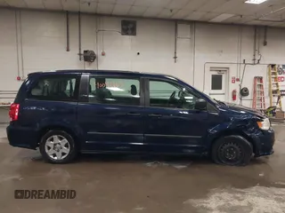 2012 Dodge Grand Caravan SE with VIN 2C4RDGBG8CR367236, listed as a IAAI auction lot 40041863 with 166,555 mi miles and . Bid and sale history available at DreamBid. Image 13.