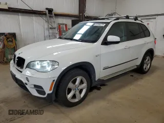 2012 BMW X5 35i z VIN 5UXZV4C58CL755969, wystawiony jako Copart lot #57286275 z przebiegiem 186 674 mil mil oraz Czysty tytuł • Clean title. Historia ofert i sprzedaży dostępna na DreamBid. Obrazek 1.