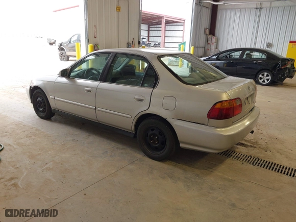 1999 Honda Civic EX with VIN 1HGEJ8640XL013417, listed as a IAAI auction lot 41915827 with 257,696 mi miles. Bid and sale history available at carsss.com. Image 3.