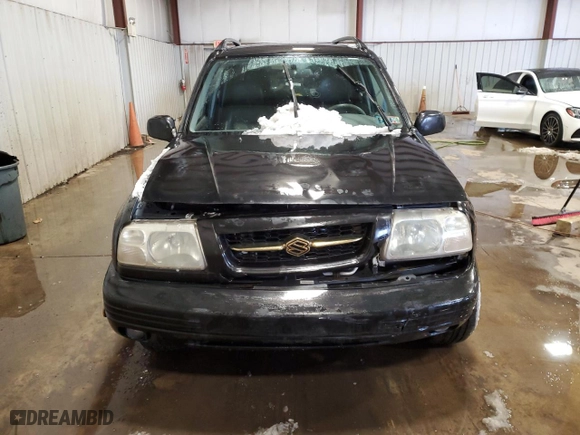 2000 Suzuki Grand Vitara JLX with VIN JS3TD62V1Y4113961, listed as a Copart auction lot 41488995 with 212,541 mi miles and Salvage Title. Bid and sale history available at carsss.com. Image 5.