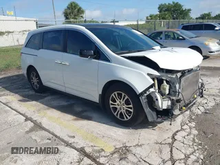 2012 Honda Odyssey EX-L with VIN 5FNRL5H61CB032353, listed as a IAAI auction lot 42471691 with 186,257 mi miles and . Bid and sale history available at DreamBid. Image 1.