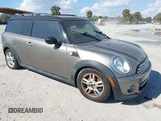 2013 MINI Clubman z VIN WMWZF3C56DT489410, wystawiony jako IAAI lot #41536337 z przebiegiem Nie podano mil oraz . Historia ofert i sprzedaży dostępna na DreamBid. Obrazek 1.