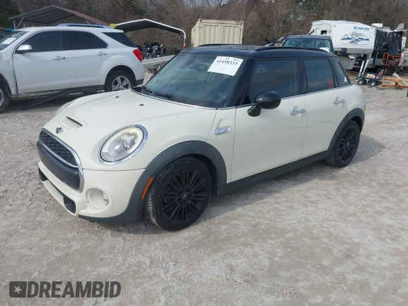 2017 MINI Hardtop 4 Door Cooper S z VIN WMWXU3C54H2D32602, wystawiony jako IAAI lot #41458333 z przebiegiem 124 235 mil mil oraz . Historia ofert i sprzedaży dostępna na DreamBid. Obrazek 17.