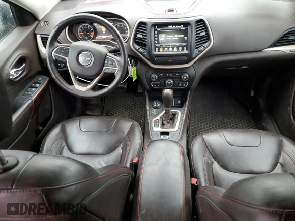 2015 Jeep Cherokee Trailhawk with VIN 1C4PJMBS9FW605075, listed as a Copart auction lot 49256195 with 103,677 mi miles and Salvage Title. Bid and sale history available at DreamBid. Image 8.