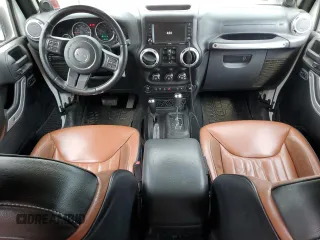 2014 Jeep Wrangler Unlimited Rubicon with VIN 1C4HJWFG4EL114743, listed as a Copart auction lot 61397575 with 110,222 mi miles and Salvage title. Bid and sale history available at DreamBid. Image 8.