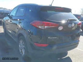 2016 Hyundai Tucson SE with VIN KM8J3CA41GU133962, listed as a IAAI auction lot 41634282 with 101,705 mi miles. Bid and sale history available at carsss.com. Image 3.