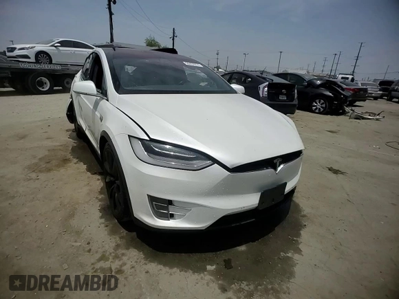 2017 Tesla Model X 90D with VIN 5YJXCAE26HF079421, listed as a Copart auction lot 47889005 with 88,281 mi miles and Salvage Title. Bid and sale history available at DreamBid. Image 10.